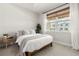 Bright bedroom featuring a large window and decor at 3981 Great Smokey Way, Apopka, FL 32712