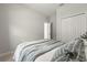 A bright bedroom with a soft color palette and a view into the hallway at 3981 Great Smokey Way, Apopka, FL 32712