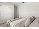 Cozy bedroom with plush carpet, a closet, and an attached room at 3981 Great Smokey Way, Apopka, FL 32712