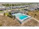 An aerial view of the neighborhood community pool and recreation area at 3981 Great Smokey Way, Apopka, FL 32712