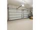 Spacious two car garage with epoxy floors and automatic garage doors at 3981 Great Smokey Way, Apopka, FL 32712