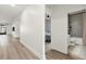 Hallway that features a doorway view of a bathroom and bedroom at 3981 Great Smokey Way, Apopka, FL 32712