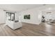Bright living room showcasing a sliding glass door, modern finishes and neutral colors at 3981 Great Smokey Way, Apopka, FL 32712