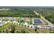 Nice aerial shot displaying the neighborhood's serene pond, neatly lined streets, and meticulously kept landscaping at 4119 Sunset Preserve Blvd, Orlando, FL 32820
