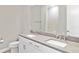 Bright bathroom featuring a double sink vanity with modern fixtures and a large mirror at 4119 Sunset Preserve Blvd, Orlando, FL 32820