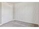 Bedroom with an accent wall and a closet with sliding doors at 4119 Sunset Preserve Blvd, Orlando, FL 32820