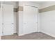 Bedroom featuring white walls, carpeted floor, and closet with sliding doors at 4119 Sunset Preserve Blvd, Orlando, FL 32820