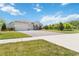 Attractive single-story home with a well-maintained lawn and paved driveway at 4119 Sunset Preserve Blvd, Orlando, FL 32820