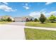 Attractive single-story home with a well-maintained lawn and paved driveway at 4119 Sunset Preserve Blvd, Orlando, FL 32820