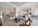 Expansive open-concept living area with stylish furnishings, connecting kitchen and dining spaces at 4119 Sunset Preserve Blvd, Orlando, FL 32820