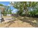 Wide backyard with patio and fencing, offering privacy and space for outdoor activities at 439 Sunrise Ct, Orlando, FL 32803