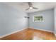 Bedroom featuring hardwood floors and natural light from window at 439 Sunrise Ct, Orlando, FL 32803