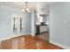 Dining room with glass French doors and a view into the kitchen at 439 Sunrise Ct, Orlando, FL 32803