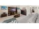 Comfortable living room with a fireplace, TV and decorative accents at 488 Kistler Cir, Clermont, FL 34715