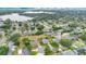 Aerial view of a neighborhood with manicured lawns at 518 Glen Grove Ln, Orlando, FL 32839