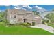 Charming two-story home with two-car garage and manicured lawn at 518 Glen Grove Ln, Orlando, FL 32839