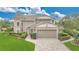 Charming two-story home with two-car garage and manicured lawn at 518 Glen Grove Ln, Orlando, FL 32839
