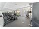 Well-equipped gym with treadmills, elliptical machines, and weight machines, providing residents with fitness options at 5276 Cane Island Loop # 302, Kissimmee, FL 34746