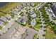Community aerial view featuring pool, playground, and lush landscaping, promoting an active and social lifestyle at 6132 Bimini Twist Loop, Orlando, FL 32819