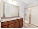 A modern bathroom featuring granite counters, a glass shower, and ceramic tile flooring at 6132 Bimini Twist Loop, Orlando, FL 32819