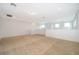 Spacious and well-lit loft area featuring neutral carpet and a bright ambiance at 6132 Bimini Twist Loop, Orlando, FL 32819