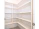 Walk-in pantry features adjustable shelving and ample storage space at 6132 Bimini Twist Loop, Orlando, FL 32819