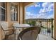 Relaxing balcony with seating and views of the neighborhood at 621 Terrace Ridge Cir # 621, Davenport, FL 33896