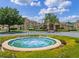 Community clubhouse and fountain create a serene and inviting atmosphere for residents at 621 Terrace Ridge Cir # 621, Davenport, FL 33896