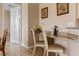 Kitchenette area with a small desk area and access to an adjoining room at 621 Terrace Ridge Cir # 621, Davenport, FL 33896