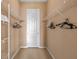 Spacious walk-in closet with ample shelving and hanging space offers efficient storage at 621 Terrace Ridge Cir # 621, Davenport, FL 33896