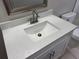 Close up of this bathroom vanity with a white countertop and brushed nickel hardware at 6624 Kristin Ct, Orlando, FL 32818