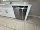 Modern stainless steel dishwasher installed beneath white cabinets at 6624 Kristin Ct, Orlando, FL 32818