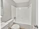 Clean bathroom featuring a shower and tub combo at 7614 Sw 80Th St, Ocala, FL 34476