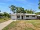 Charming single-story home with a well-manicured lawn and a classic architectural design at 7614 Sw 80Th St, Ocala, FL 34476