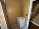 Modest bathroom featuring a tiled shower, and built-in shelving at 825 Poinsettia Dr, Eustis, FL 32726
