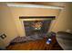 Close-up of a brick fireplace with metal screen at 825 Poinsettia Dr, Eustis, FL 32726