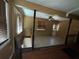 Split level living room featuring hardwood floors and natural light at 825 Poinsettia Dr, Eustis, FL 32726
