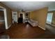Living room features hardwood floors and furniture at 825 Poinsettia Dr, Eustis, FL 32726