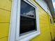 Close up of the window showing updated trim at 825 Poinsettia Dr, Eustis, FL 32726