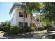 Charming two-story home with well-maintained landscaping, lush greenery, and inviting curb appeal at 9005 Reflection Pointe Dr, Windermere, FL 34786