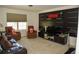 Inviting theater room with comfortable seating, large screen, and built-in entertainment center at 9005 Reflection Pointe Dr, Windermere, FL 34786