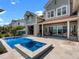 Beautiful backyard with pool, spa, outdoor kitchen and covered patio, ideal for entertaining at 9916 Lone Tree Ln, Orlando, FL 32836