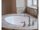 Elegant bathroom sink with designer faucet at 9916 Lone Tree Ln, Orlando, FL 32836