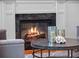 Marble fireplace providing a focal point in the living room, enhancing the room's inviting atmosphere at 9916 Lone Tree Ln, Orlando, FL 32836