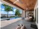Beautiful patio featuring a jacuzzi, outdoor seating and a summer kitchen at 9916 Lone Tree Ln, Orlando, FL 32836