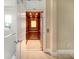Residential elevator showcasing wood-paneled interior and convenient access between floors at 10371 Kensington Shore Dr # H-201, Orlando, FL 32827