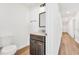 A bathroom featuring a toilet, vanity with dark cabinets, and a mirror at 1040 20Th St, Orlando, FL 32805