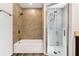 Bright bathroom with modern fixtures, bathtub, and glass enclosed shower at 1040 20Th St, Orlando, FL 32805
