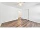 A bedroom has wood-look floors, white walls, and a closet at 1040 20Th St, Orlando, FL 32805