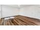 Well-lit bedroom with wood-look flooring and a door at 1040 20Th St, Orlando, FL 32805
